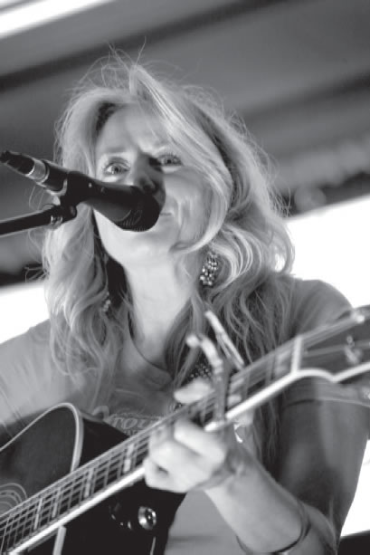 Carter sings as part of this year’s Singer/Songwriter Concert.