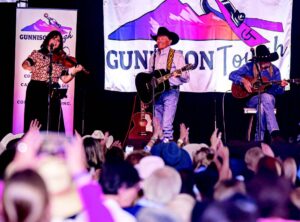 Jenee Fleenor, George Straight, and Dean Dillon perform at the 2025 Songwriter Shuffle.