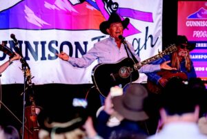 George Straight on stage at the Gunnison Tough Songwriter Shuffle in July of 2025.