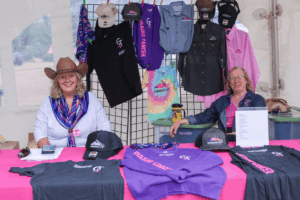 GT Volunteers greet people looking to buy GT merchandise.